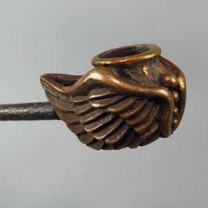 May include: A set of three ceramic mugs with a speckled, matte finish. The mugs are in shades of cream, light gray, and dark gray. Each mug has a simple, minimalist design and a rounded handle.