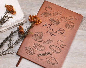 May include: A brown leather-bound recipe book with the text "Mom's Best Recipes" and illustrations of various foods, including a hot dog, a steak, a pie, and pancakes.