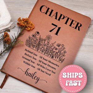 May include: A brown leather journal with the words "CHAPTER 71" in large black letters. Below, a floral design and the text "Behind You - All Your Memories, Before You - All Your Dreams, Around You - All Who Love You, Within You - All You Need." The name "hailey" is written below.