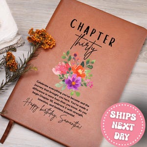 May include: A brown leather journal with the words "CHAPTER Thirty" and a floral design. The journal has the text "Happy birthday, Samantha" and a message about embracing Chapter 30. A pink circle with the words "SHIPS NEXT DAY" is in the bottom right corner.