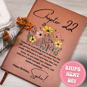 May include: A brown leather journal with the words "Chapter 22" and a floral design. The journal includes the text "Celebrate everything you've become" and "Happy Birthday, Sophia!"