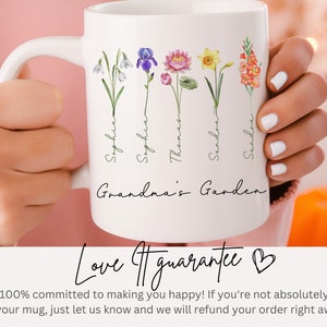 May include: White ceramic mug with a floral design and the text "Grandma's Garden". The flowers are labeled with names, including Sophia, Thomas, and Sandra.