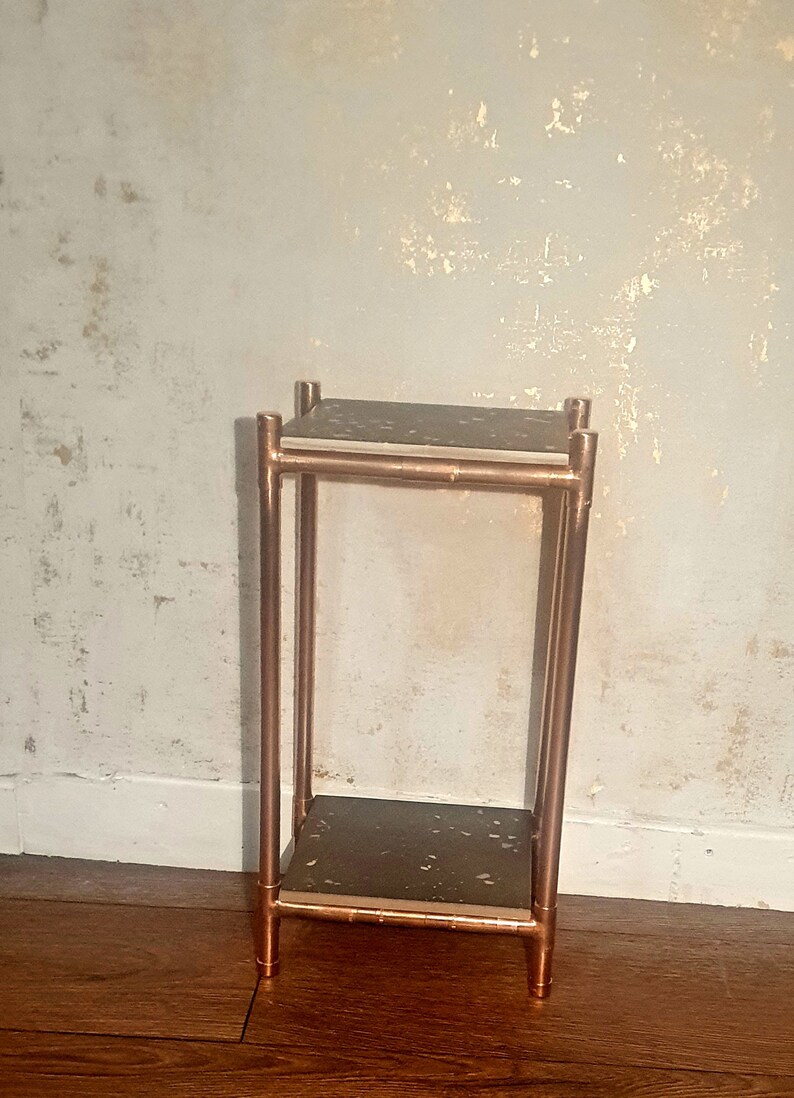 Tall Copper Plant Stand with a grey tutti frutti patterned Etsy