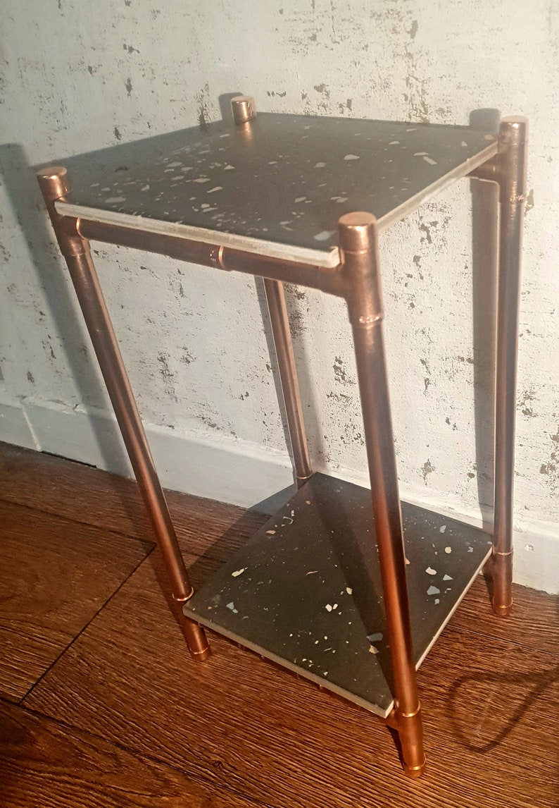 Tall Copper Plant Stand with a grey tutti frutti patterned Etsy
