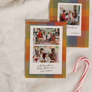 May include: Two holiday greeting cards with family photos, featuring a plaid pattern in shades of orange, green, and blue. One card says "christmas" and "the simpsons". The other card says "with love from, katie, thom, erin and maesie". A candy cane is in the corner.