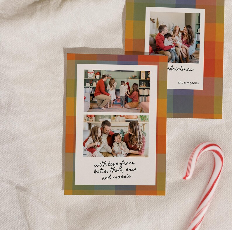 May include: Two holiday greeting cards with family photos, featuring a plaid pattern in shades of orange, green, and blue. One card says "christmas" and "the simpsons". The other card says "with love from, katie, thom, erin and maesie". A candy cane is in the corner.