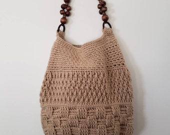 Crocheted handbag/shoulder bag, fully lined with beaded wooden handle.