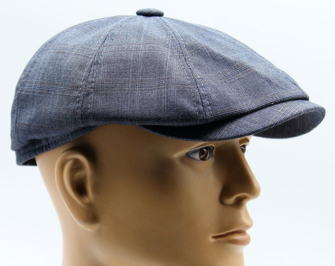 Men's cap for summer newsboy hat is grey.