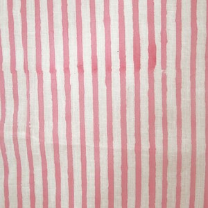 May include: Pink and white striped fabric with a subtle linen texture.