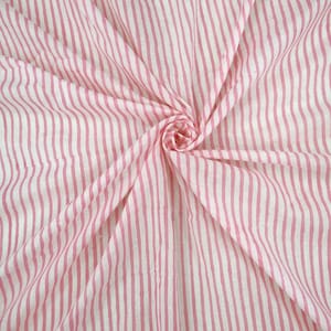 May include: Pink and white striped fabric with a wavy pattern. The fabric is folded and draped.