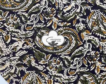 May include: A black fabric with a paisley pattern in shades of green, white, and gold. The fabric has a vintage feel and would be perfect for a variety of projects.