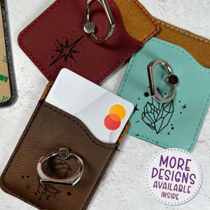 Cartera para teléfono - Diseños celestiales, polipiel, grabado en un lado, agarre con anilla