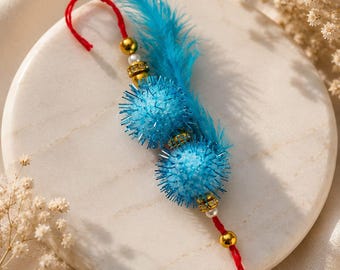 Blue Feather Rakhi | Traditional Raksha Bandhan Thread, Pom-Pom, Beads