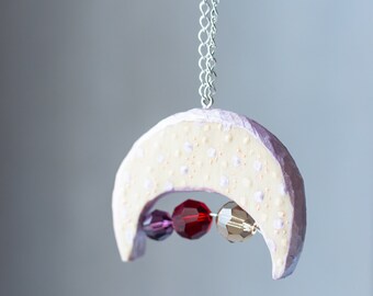 Wooden pendant with silver chain