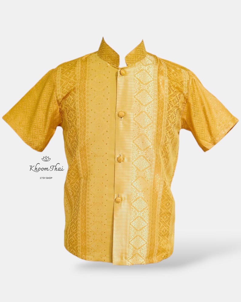 May include: A gold short-sleeved shirt with a mandarin collar and a button-up front. The shirt has a patterned design with a vertical stripe down the centre.