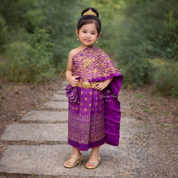traditional thai dress Girl Outfit | Girl's Chut Thai Set | Girl's Thai Clothing | Chut Thai Phuying Dek cultural events Product Type:Add-Ons Beautiful konic_create-2026-3-16-16:20:18 Women's Blue/Striped Off-the-shoulder dress