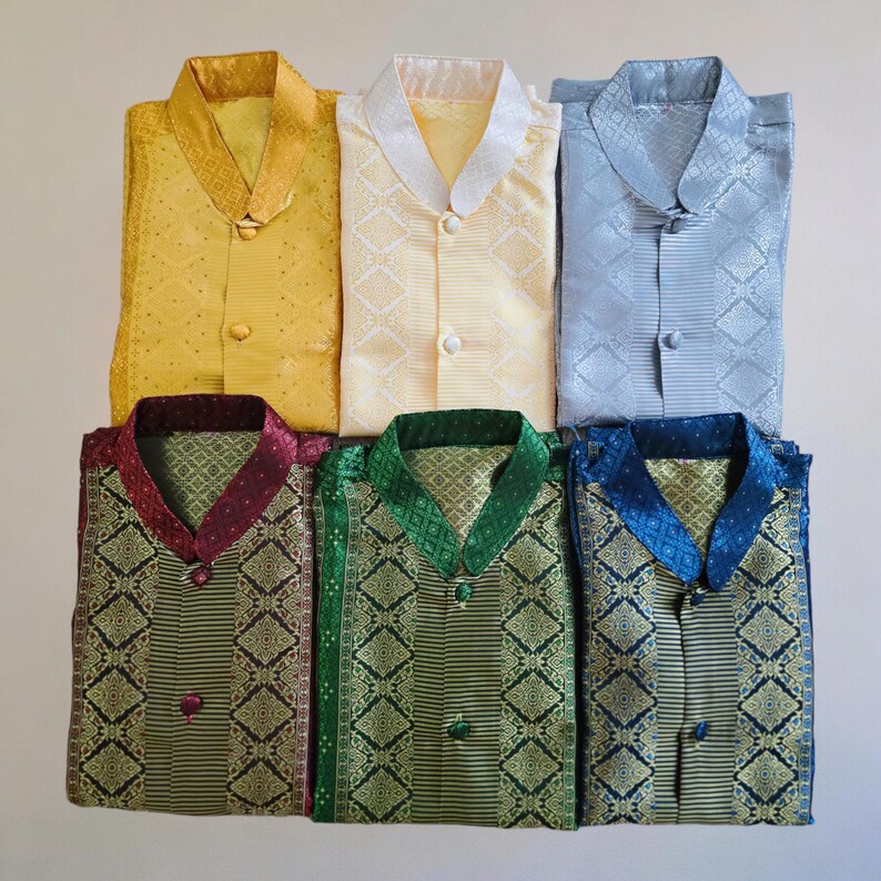 May include: Six patterned shirts with mandarin collars and button fastenings. The shirts are in a variety of colours, including yellow, light blue, maroon, green, and blue.