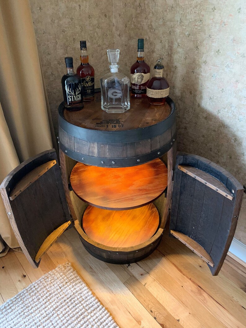 Bourbon Barrel Cabinet with custom engraved head.