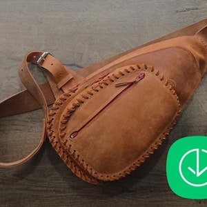 May include: A brown leather crossbody bag with a stitched flap and a red zipper. The bag has a long adjustable strap.