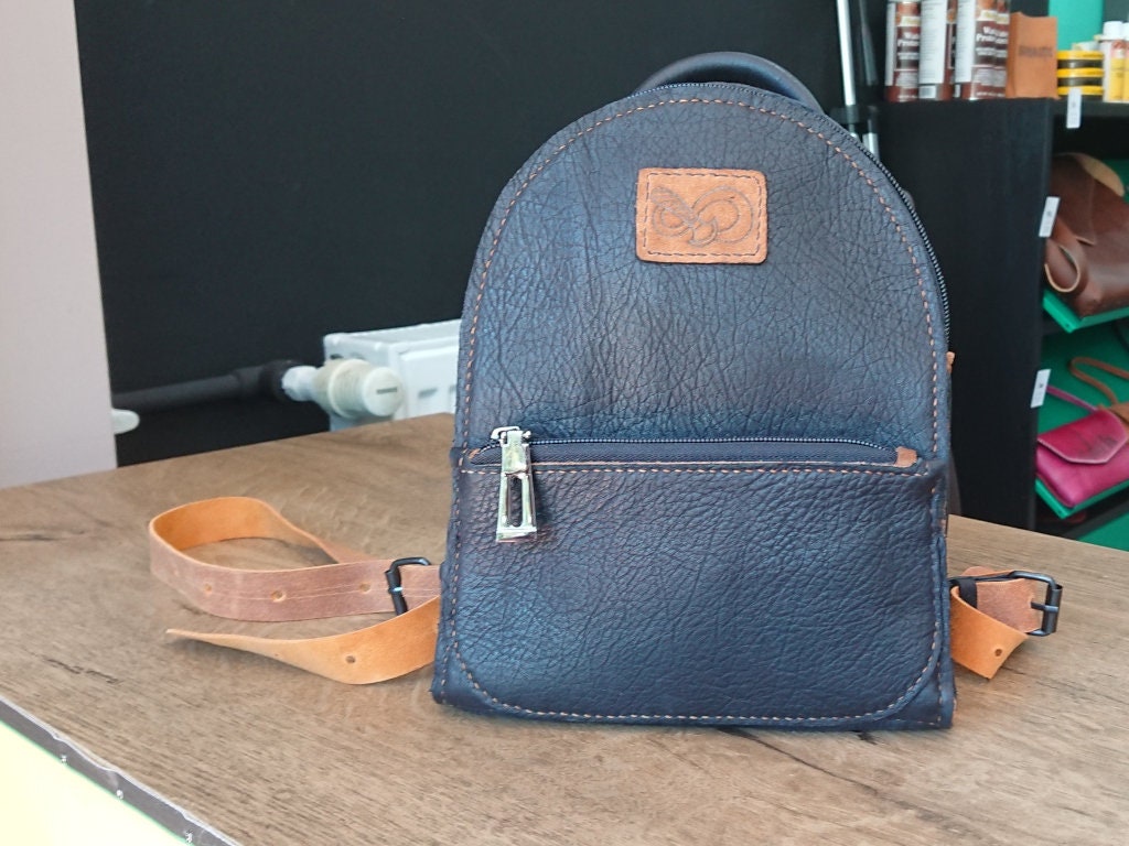 crosshatched leather backpack Herschel Supply Co. Heritage – ShopCGX A secure zippered main closure protects your essentials Herschel Supply Co. Heritage Black
