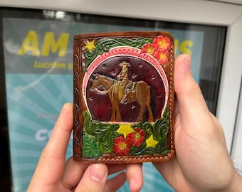 Handmade cow leather wallet, vertical orientation, with art on the cover