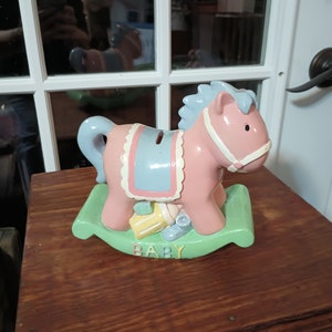 Pink ceramic Baby rocking horse bank