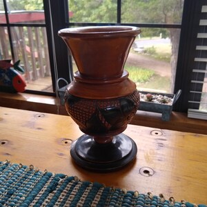 Vintage hand carved wooden footed Vase