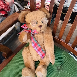 Teddy Bear with a plaid ribbon and glasses