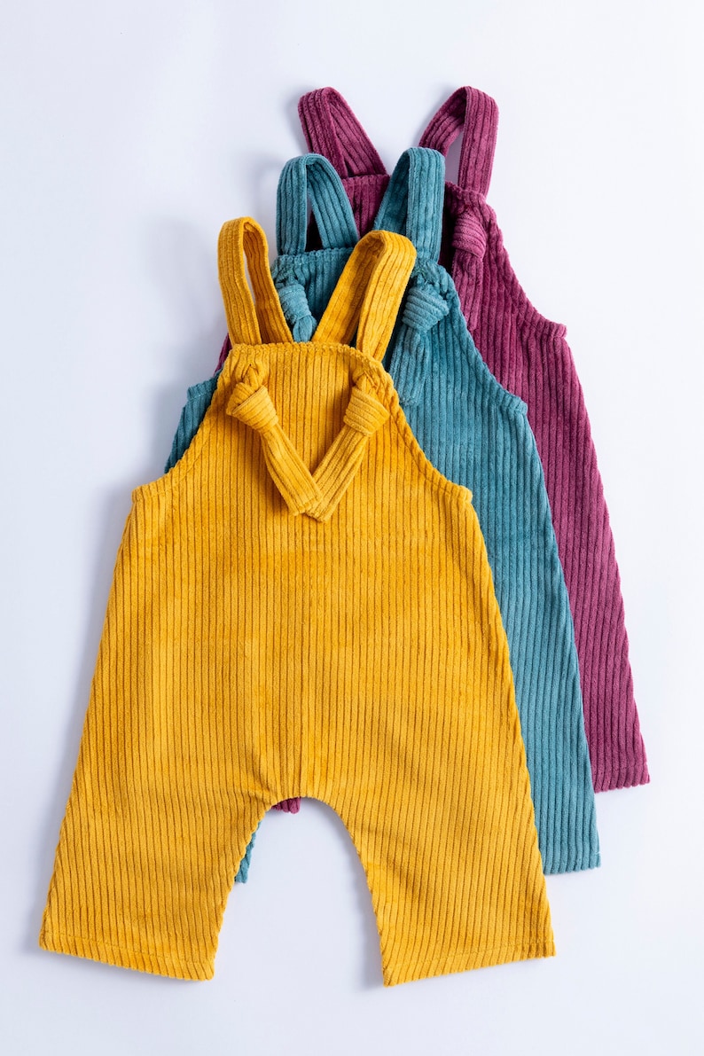 Children's corduroy dungarees with knot strap in Mustard, Teal& Berry colours