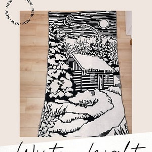 May include: Black and white crochet pattern for a winter scene with a cabin, trees, and a moon. The pattern is titled "Winter Night" and is a mosaic crochet pattern.