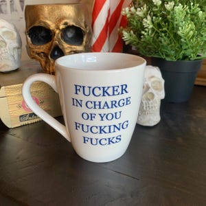 Fucker In Charge Coffee Mug