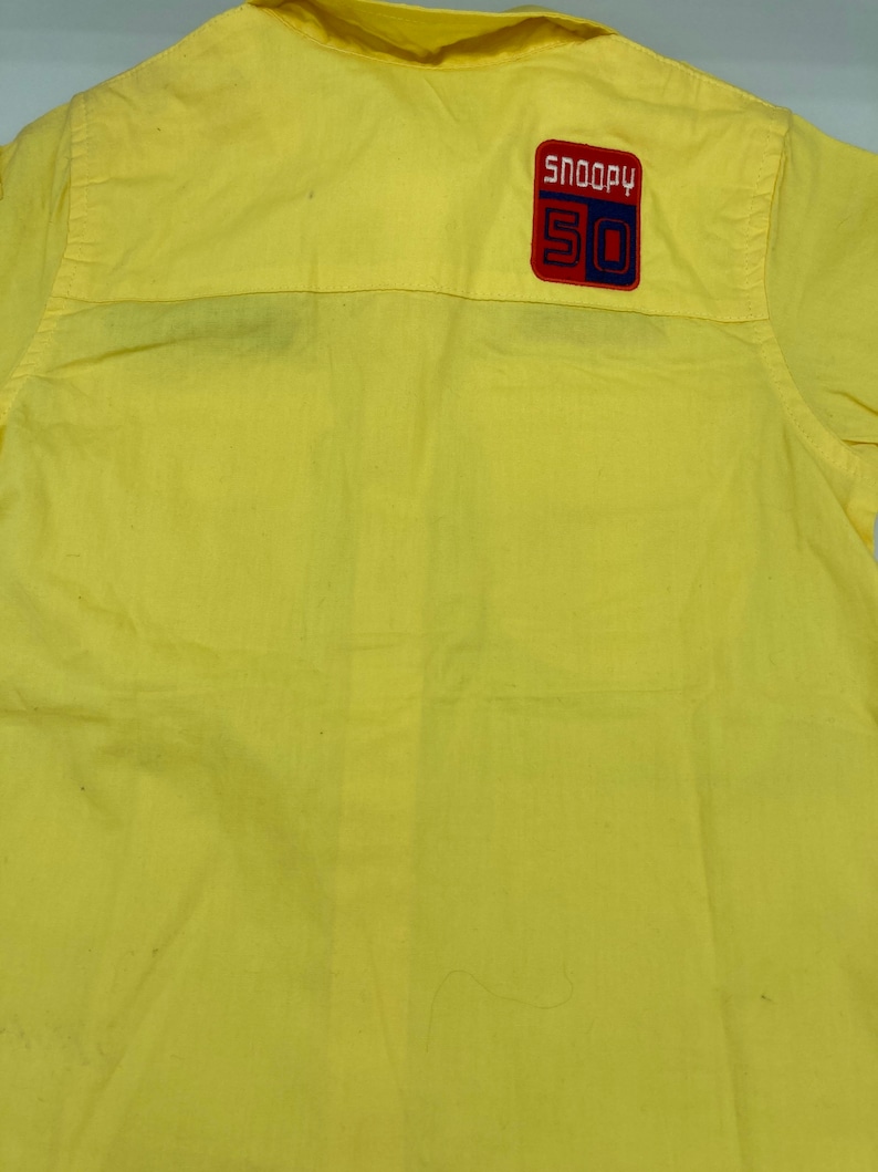 Snoopy Pilot Shirt in Yellow toddler XS in cotton never been worn Snoopy 50th anniversary