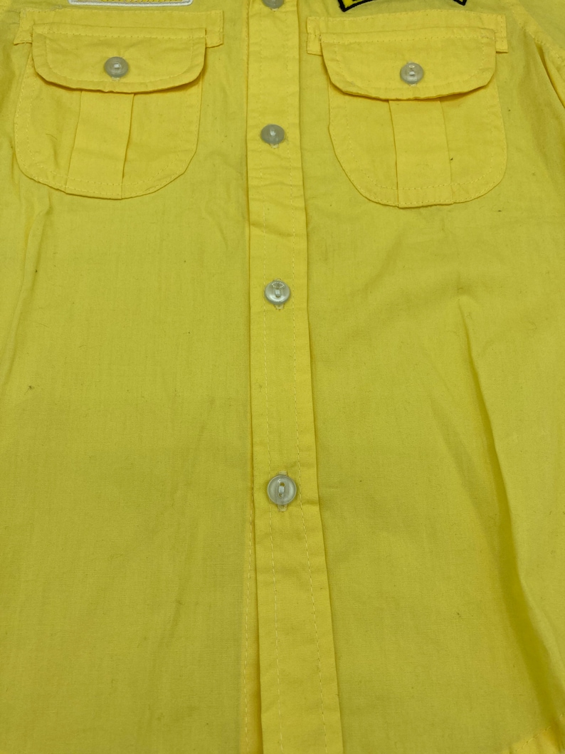 Snoopy Pilot Shirt in Yellow toddler XS in cotton never been worn Snoopy 50th anniversary