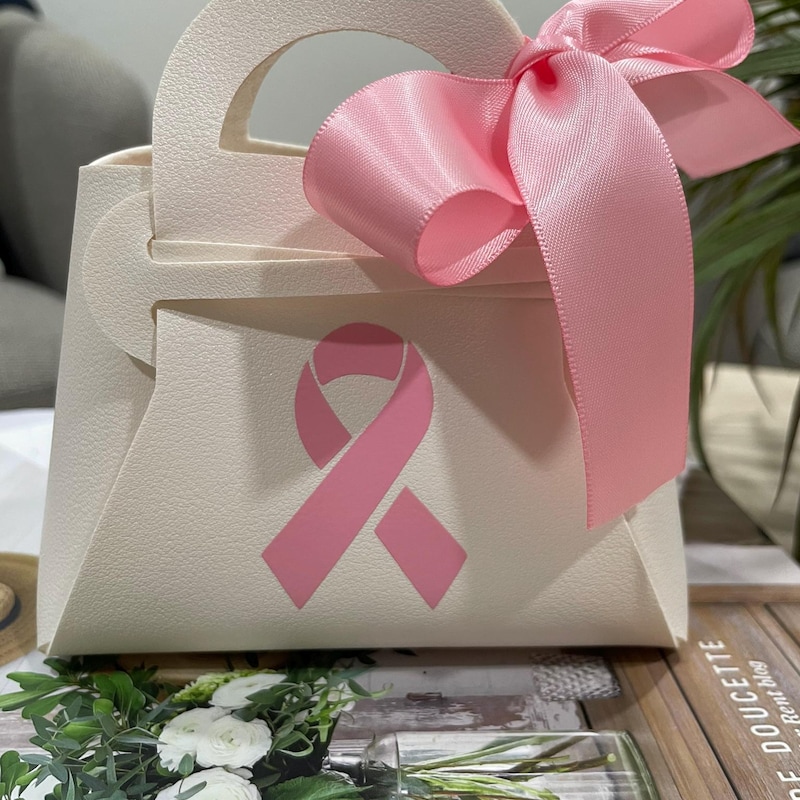 Gift Bags with Tissue Paper and Colorful Floral Patterns Stock Gift Bags with Tissue Paper and Colorful Floral Patterns Stock