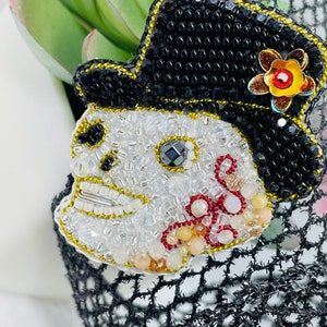Smiling Beaded Skull hat Brooch