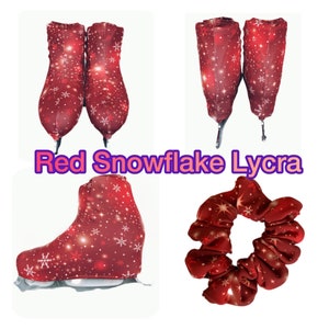 May include: Red snowflake lycra skate boot covers and a red snowflake lycra scrunchie. The covers are made of a stretchy fabric with a red background and white snowflakes. The scrunchie is made of the same fabric and has a gathered design.