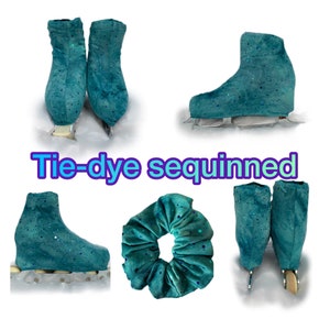 May include: Teal blue tie-dye ice skate covers with sequins. The covers are made of a soft, velvety material and are designed to protect ice skates from damage. The covers are also decorated with sequins, which add a touch of sparkle and glamour.