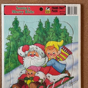 Weihnachtsmanns lustige Fahrt Goldene Bücher Rahmentablett-Puzzle, 1993 Weihnachtsmanns lustige Fahrt Rahmen-Tablett-Puzzle, Weihnachtsmanns lustige Fahrt Rahmen-Tablett-Puzzle 8279-25