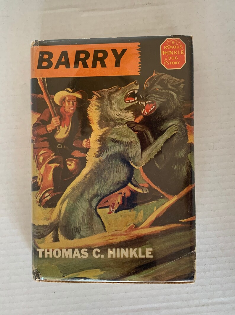 May include: A vintage book cover with a yellow and orange background. The title "BARRY" is in large, bold, black letters. The cover features an illustration of a man with a gun, a wolf, and another dog. The text "A FAMOUS HINKLE DOG STORY" is in a red octagon.