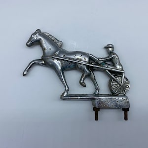 Mascotte de voiture en fer à cheval en métal nickelé