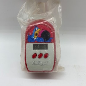 Kellogg’s Froot Loops Toucan Sam Projector Alarm Clock, Kelloggs Froot Loops Cereal Toy New in Package Toucan Projector Alarm Clock, VTG Toy