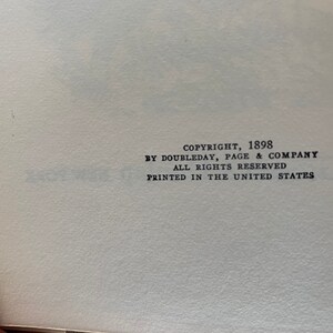 May include: Copyright information for a book published in 1898 by Doubleday, Page & Company. The text states "All rights reserved" and "Printed in the United States."