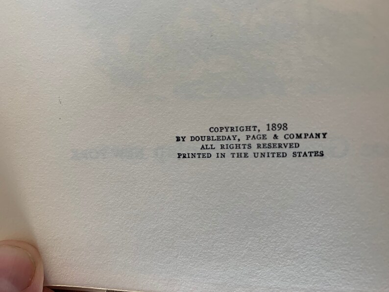 May include: Copyright information for a book published in 1898 by Doubleday, Page & Company. The text states "All rights reserved" and "Printed in the United States."