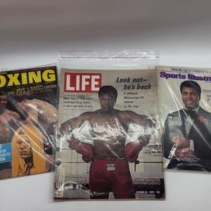 3 revistas de Muhammad Ali: Life, 23 de octubre de 1970; International Boxing Magazine, edición de colección, noviembre de 1971; Sport Illustrated, 23 de diciembre de 1974.