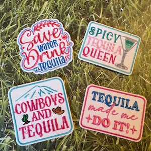 May include: Four embroidered patches with tequila-themed phrases. One patch says "Save Water Drink Tequila", another says "Spicy Tequila Queen", a third says "Cowboys and Tequila", and the last says "Tequila made me + DO IT!+".
