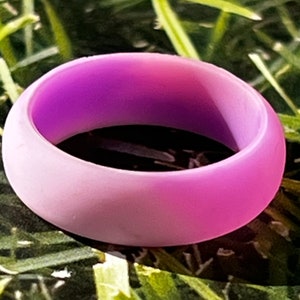 May include: A purple silicone ring with a gradient fade from a darker purple to a lighter purple.