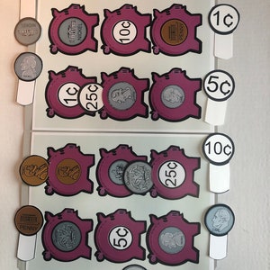 May include: A learning game for kids to match US coins with their corresponding values. The game features piggy banks with coin amounts and individual coins with their denominations. The coins include a penny, nickel, dime, and quarter.