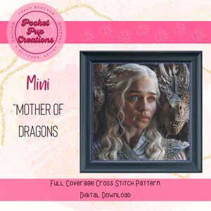 May include: A framed cross-stitch pattern featuring a portrait of a woman with long, white hair and blue eyes, flanked by dragons. The text "Mini" and "MOTHER OF DRAGONS" are displayed. The image is labeled "FULL Coverage Cross Stitch Pattern" and "Digital Download".
