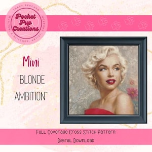 May include: A black framed cross stitch pattern of a woman with blonde hair wearing a red dress. The title of the pattern is "Mini "BLONDE AMBITION"".
