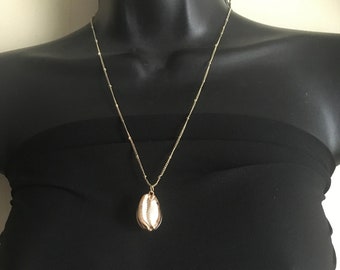 Gold cowrie shell necklace, elegant  necklace, gift for her, statement jewelry, beachwear necklace,